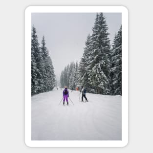 People skiing on the snowy slope Sticker